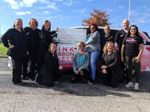 ReVision Gives Back Check Presentation Pink Ribbon Girls